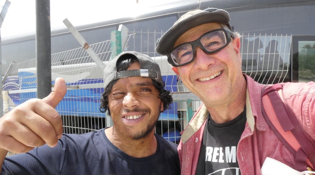 Awdah Hathaleen, left, with Kehilla Community Synagogue member Jim Haber. 