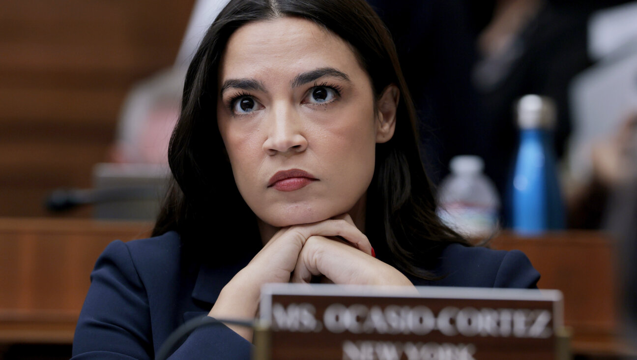 Rep. Alexandria Ocasio-Cortez (D-NY) listens during a mark up meeting with the House Committee on Energy and Commerce on Capitol Hill, May 13. 