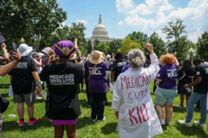 Care workers gather outside the Capitol in June 2025 to protest Medicaid cuts.