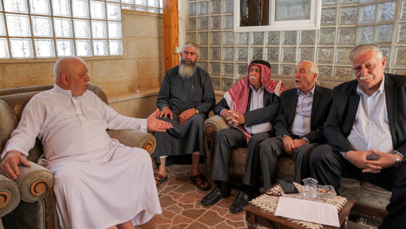 Aref al-Jaabari (2nd-R), former governor of Hebron and head of the Jaabari family in the area, attends a meeting with elders of the Jaabari family to deny media reports it was ready to break off from the Palestinian Authority and sign a peace deal with Israel as a separate emirate, in Hebron in the occupied West Bank on July 6, 2025. (Photo by HAZEM BADER / AFP) (Photo by HAZEM BADER/AFP via Getty Images)