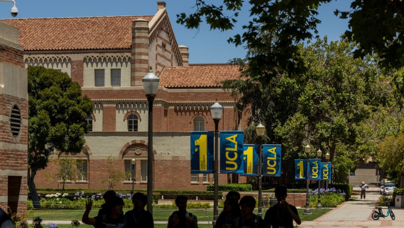 People walk around UCLA on Thursday, July 10, 2025 in Westwood, CA.
