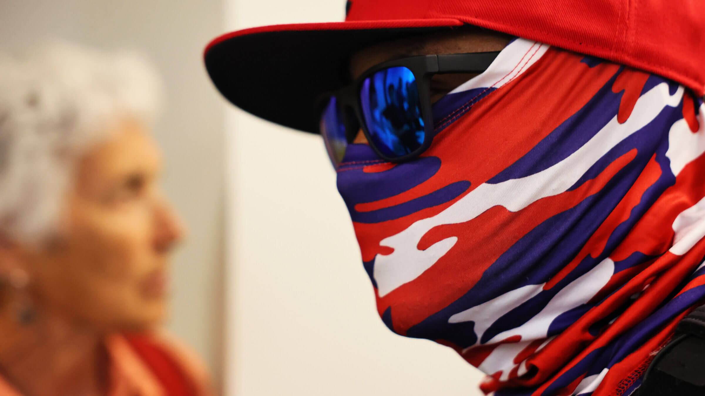 Federal agents wearing masks patrol the halls of immigration court in New York.