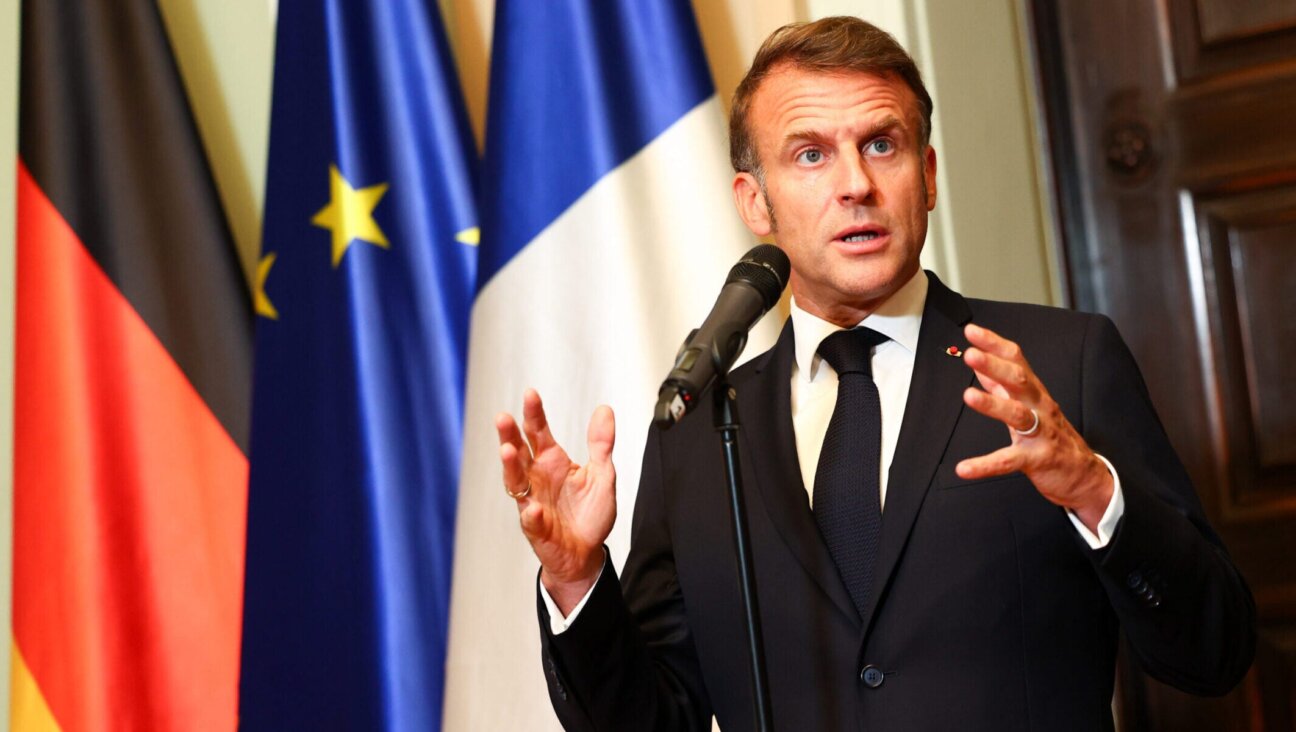 French President Emmanuel Macron talks to media in Berlin on July 23, 2025. 