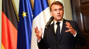 French President Emmanuel Macron talks to media in Berlin on July 23, 2025. 