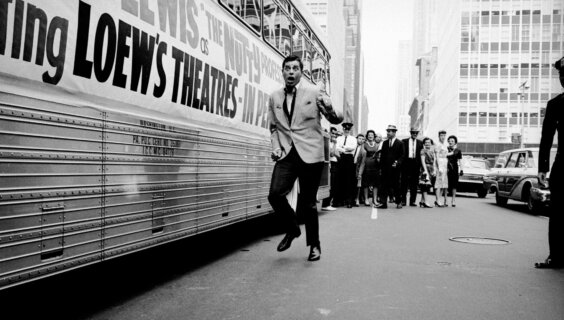 American comedian and actor Jerry Lewis pretends to run from adoring fans during the promotional tour for the film “The Nutty Professor,” directed by and starring Lewis, in 1963. (Arthur Schatz/Getty Images)