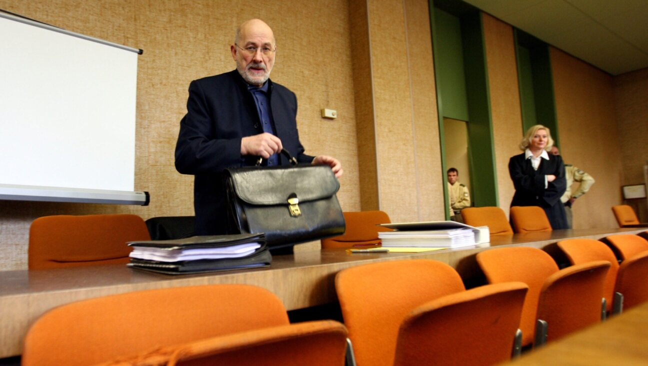 Right-wing extremist Horst Mahler and his lawyer attend the trial against Mahler at the country court on Jan. 12, 2009 in Munich.