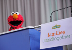 Sesame Street resident Elmo addresses the crowd at the screening of "Families Stand Together: Feeling Secure in Tough Times."