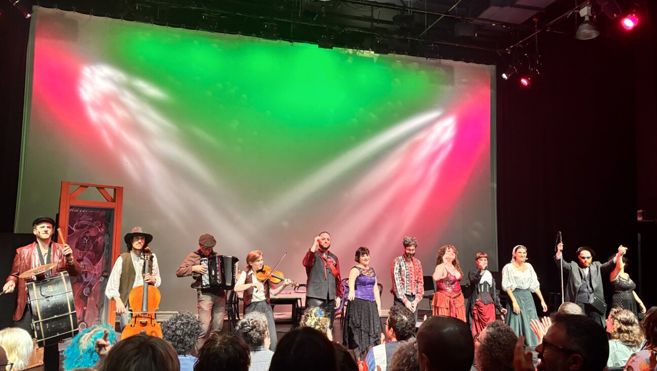 The cast of "Feast of the Seven Sinners" lines up at curtain call.