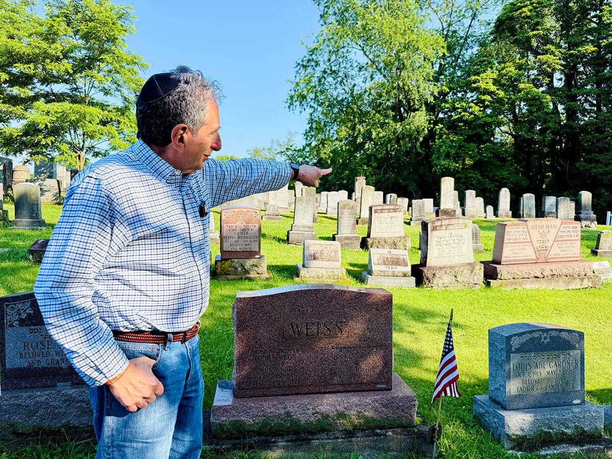 Alan Iszauk at Elrod Cemetery, where generations of McKeesport’s Jewish community — including his own family — are buried.