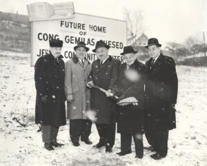 The groundbreaking at Gemilas Chesed synagogue in White Oak Pennsylvania, on Jan. 21, 1962. Rabbi Irvin Chinn is on the far right.
