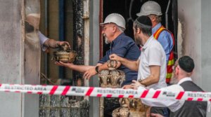 Congregants recover items from the Adass Israel Synagogue on December 06, 2024 in Melbourne, Australia.