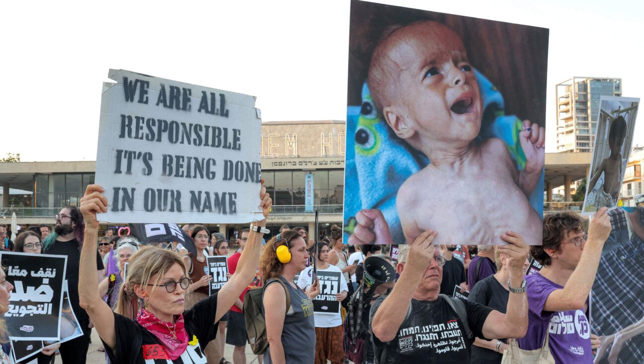 Israeli activists protest the ongoing war in Gaza on July 22, denouncing food shortages within the strip.
