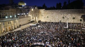 Jews gather at the Wall Western in the Old City of Jerusalem, at the end of Tisha B’Av fast, on Aug. 13, 2024.