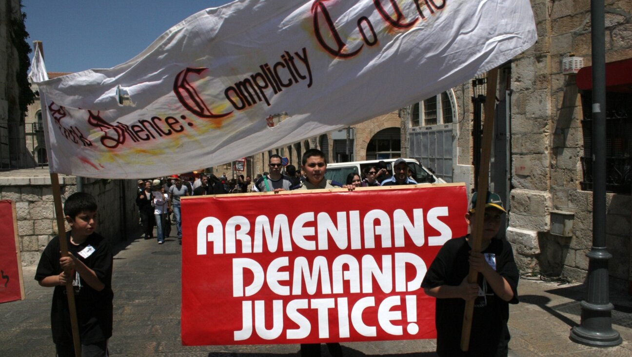 The Armenian community of the Old City of Jerusalem make a protest demanding that the Israeli government recognize the historic mass killings of Armenians under the Ottoman Empire, on April 24, 2005. 