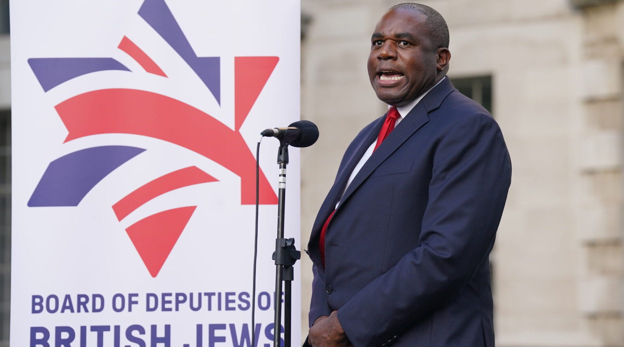 The then-British Shadow Foreign Secretary David Lammy speaking during a vigil outside Downing Street, central London, for victims and hostages of Hamas’ attack on Israel, organized by The Board of Deputies of British Jews, Oct. 9, 2023.