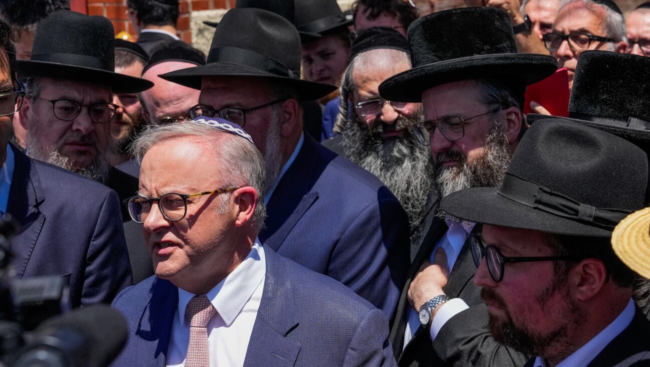 Australian Prime Minister Anthony Albanese speaks to the media after he visited the damaged Adass Israel Synagogue in Melbourne, Australia, Dec. 10, 2024. An arson attack on the Adass Israel Synagogue in Melbourne forced congregants to flee as flames engulfed the building. Albanese condemned the incident as an antisemitic act, emphasizing that such violence at a place of worship is unacceptable in Australia and labelling the event an act of terrorism. 