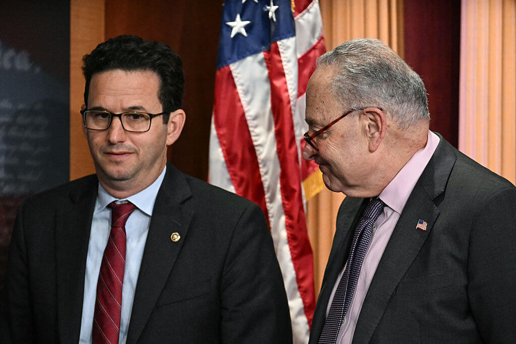 (L-R) Senator Brian Schatz from Hawaii and Senate Minority Leader Chuck Schumer from New York on April 1.