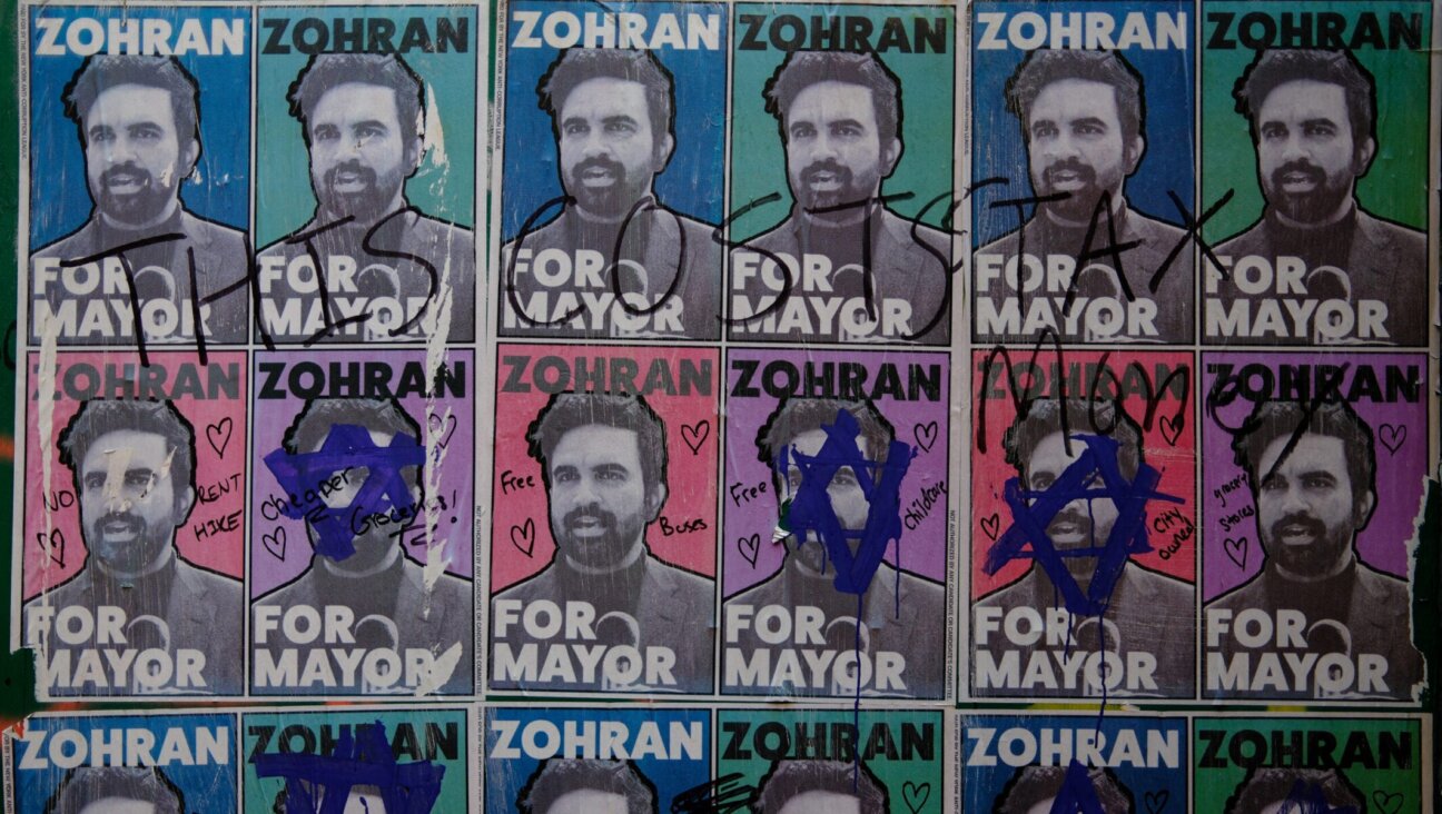 Graffiti, including Stars of David, is seen on posters of Zohran Mamdani, Democratic candidate for mayor of New York, on July 22, 2025 in New York.