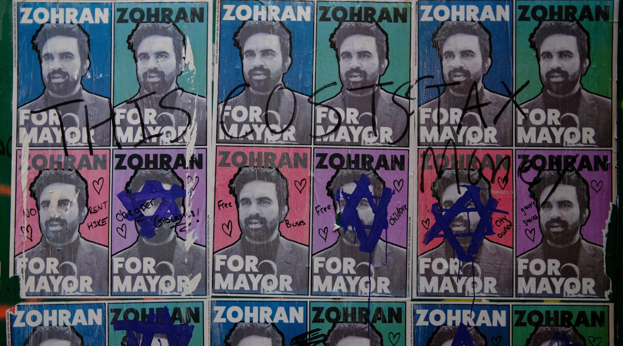 Graffiti, including Stars of David, is seen on posters of Zohran Mamdani, Democratic candidate for mayor of New York, on July 22, 2025 in New York.