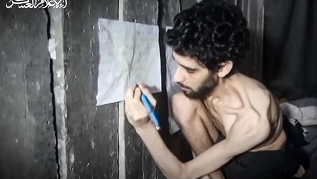 A clip from a video released by Hamas of Israeli hostage Evyatar David looking weak and malnourished. 
