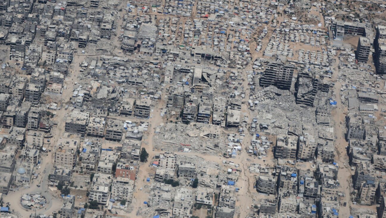 An aerial view of Gaza City as efforts to drop humanitarian aid supplies through parachute by military cargo planes into the city continued on Aug. 6. 