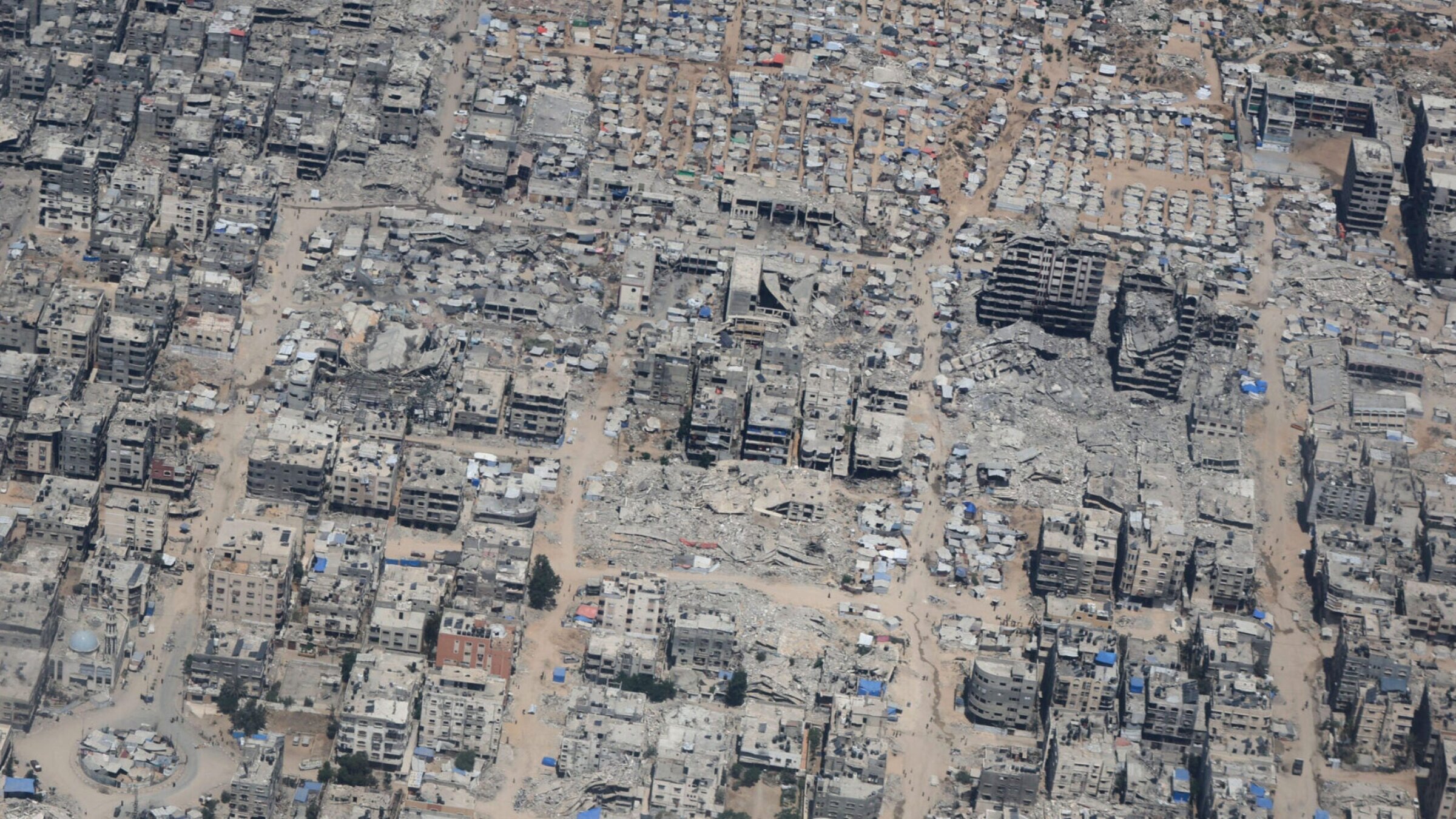 An aerial view of Gaza City as efforts to drop humanitarian aid supplies through parachute by military cargo planes into the city continued on Aug. 6. 