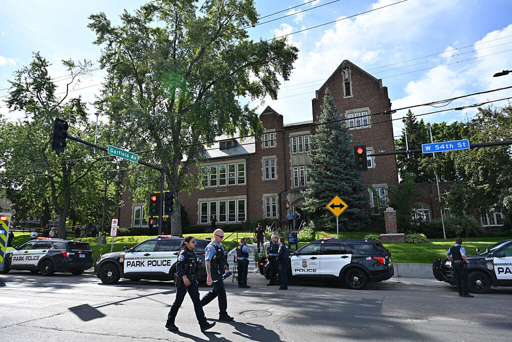 Police and first responders at the scene of a school shooting at the Annunciation Catholic Church in Minneapolis on August 27.