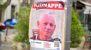 A poster of a photo of Israeli hostage Ilan Weiss, kidnapped on October 7, 2023 in the Gaza Strip, on a pole in a street in Avignon, France, on April 27, 2025. 