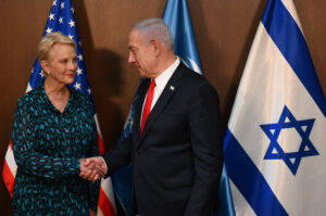 Cindy McCain, executive director of the World Food Programme, shakes hands with Israeli Prime Minister Benjamin Netanyahu