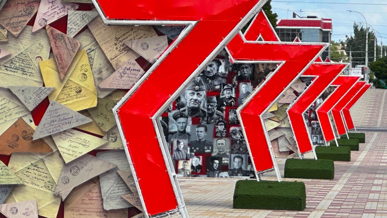 Enormous red stars containing patriotic images of World War II line the main boulevard of Tiraspol, capital of the breakaway region of Transnistria, as seen in June 2025.