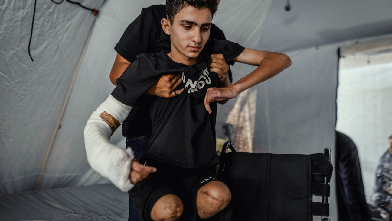 Ahmad Abdullah Al-Ghalban, a 16-year-old Palestinian boy in Gaza whose injuries sustained in an Israeli airstrike — which killed his brother — led to the amputation of both his legs and the loss of several fingers on his hand.Since the 
 incident, the Al-Ghalban family has lacked shelter and adequate medical care.