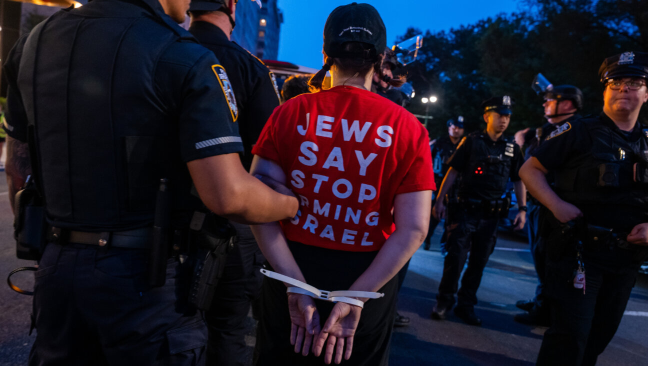 People are arrested by police during a march by Jewish peace activists protesting the war in Gaza, New York City, Aug 4.