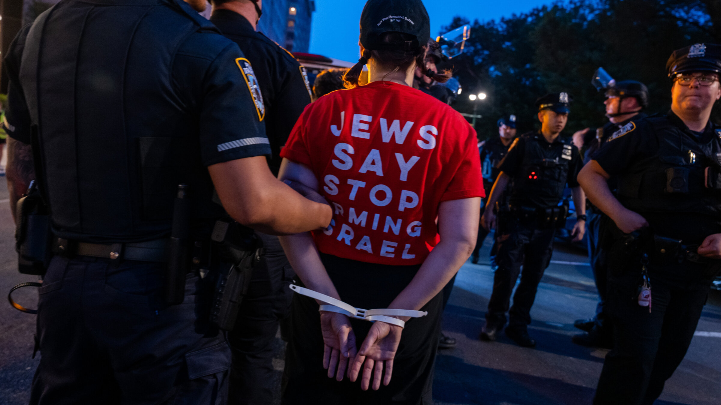 People are arrested by police during a march by Jewish peace activists protesting the war in Gaza, New York City, Aug 4.