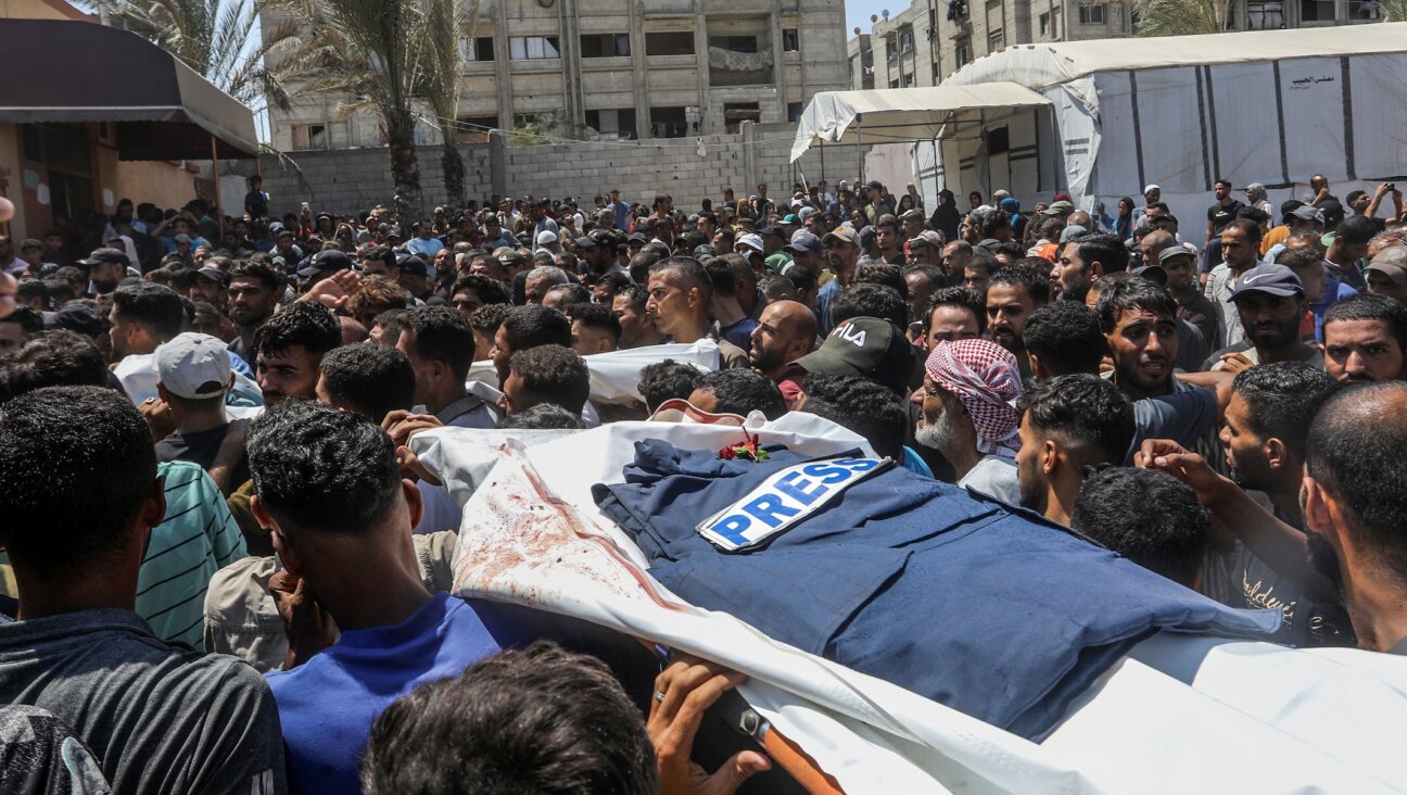 A funeral ceremony is being held in the courtyard of Nasser Hospital for Reuters photojournalist Hossam al-Masri, Al Jazeera cameraman Mohammed Salameh, journalist Maryam Abu Deqqa, who worked with several media outlets including Independent Arabia and AP, and NBC News journalist Moaz Abu Taha, all of whom were killed in an Israeli attack on the hospital in Khan Yunis, Gaza on August 25, 2025.
