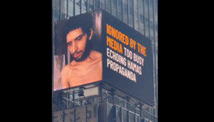 A billboard in New York City’s Times Square displaying a video released last week by Hamas of one of its Israeli hostages, Evyatar David. (Screenshot)