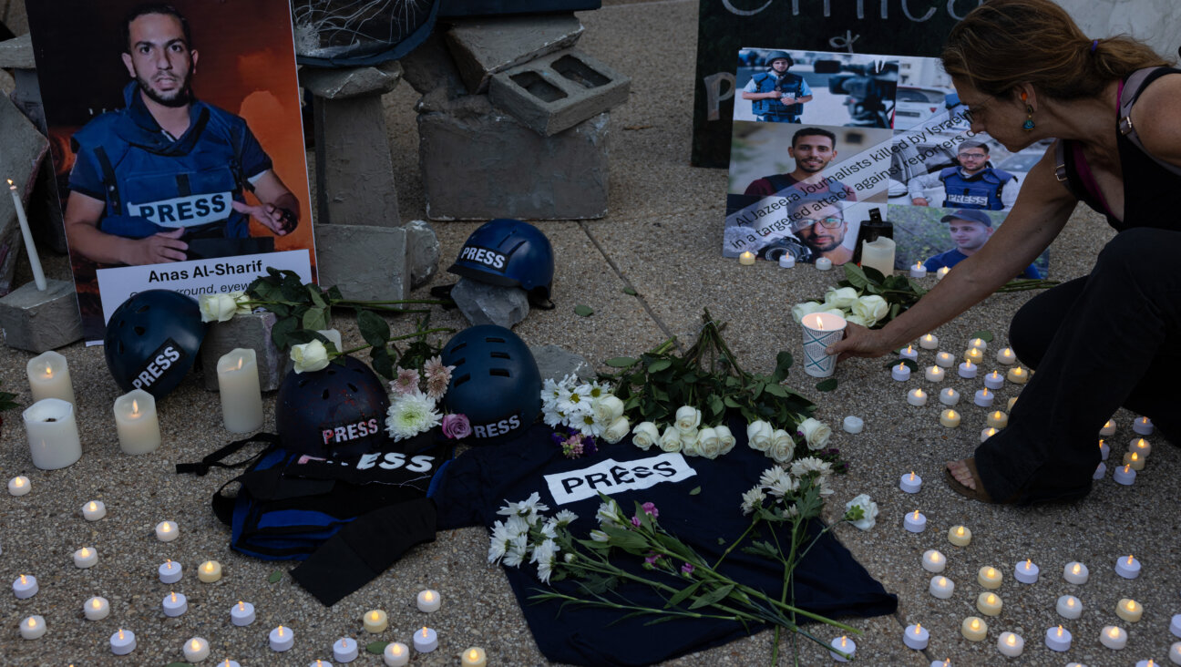 A vigil for Palestinian journalist Anas al-Sharif outside the Fox News and NBC News headquarters in Washington, D.C., on Aug. 11. 