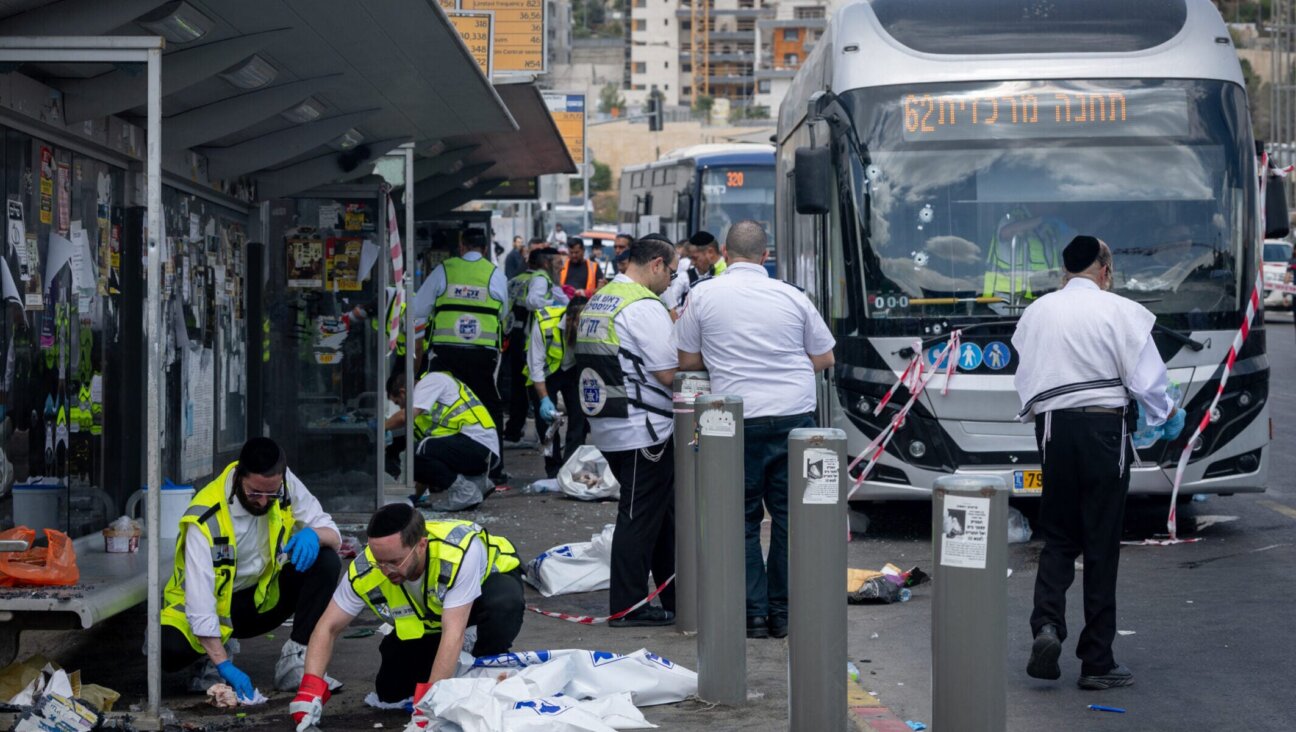 Police and rescue personnel at the scene of a terror attack at Ramot Junction, near the entrance to Jerusalem, Sept. 8, 2025.