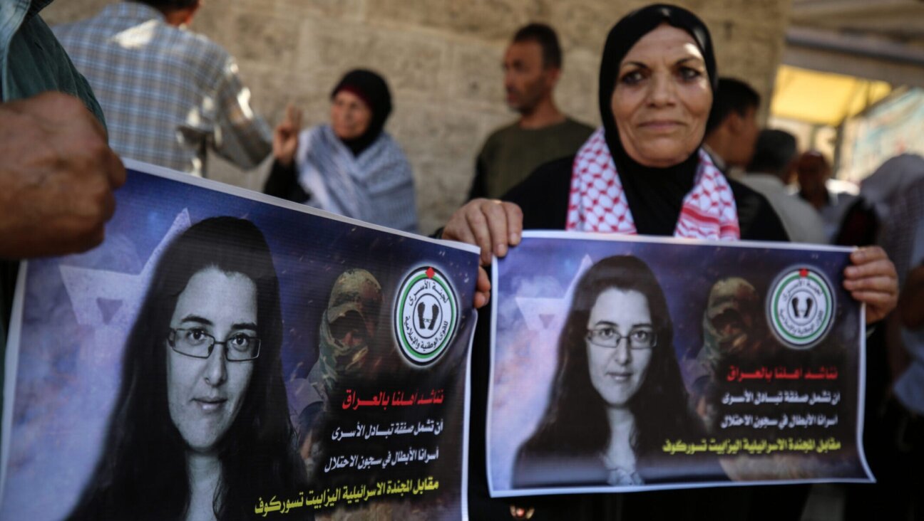 Members of the Palestinian Prisoners Committee hold a rally outside the International Committee of the Red Cross office in Gaza City on July 17, 2023, demanding the Iraqi government to include Palestinian prisoners in Israeli jails in the exchange for Israeli-Russian academic Elizabeth Tsurkov.