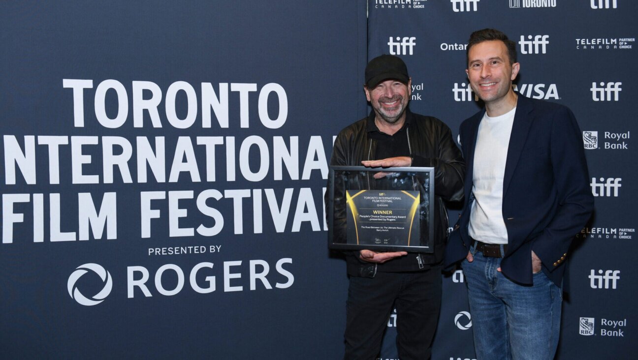 Barry Avrich, winner of the People’s Choice Documentary Award presented by Rogers for “The Road Between Us: The Ultimate Rescue” poses with Mark Selby (R) at the 2025 TIFF Awards Ceremony during the 2025 Toronto International Film Festival on Sept. 14, 2025 in Toronto.