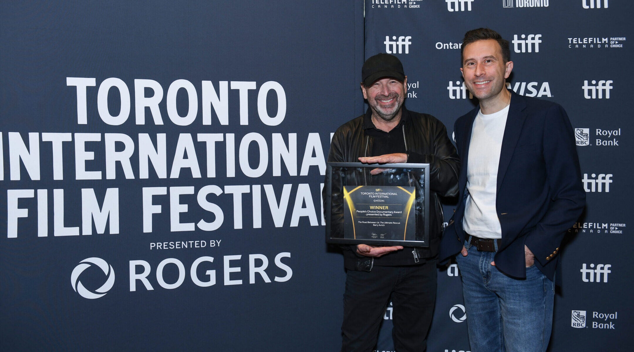 Barry Avrich, winner of the People’s Choice Documentary Award presented by Rogers for “The Road Between Us: The Ultimate Rescue” poses with Mark Selby (R) at the 2025 TIFF Awards Ceremony during the 2025 Toronto International Film Festival on Sept. 14, 2025 in Toronto.