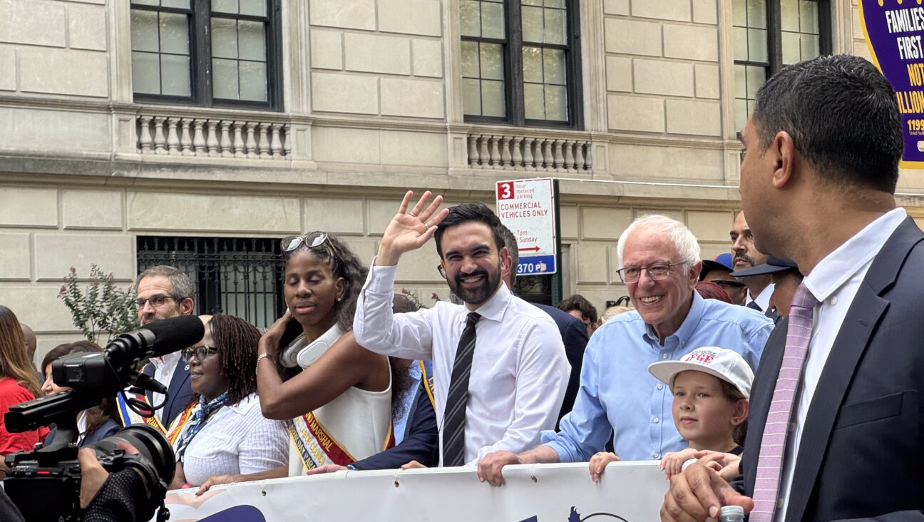 Zohran Mamdani and Bernie Sanders march together at the 2025 NYC Labor Day Parade. 