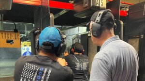 Lox & Loaded members learn how to use firearms at a shooting range.