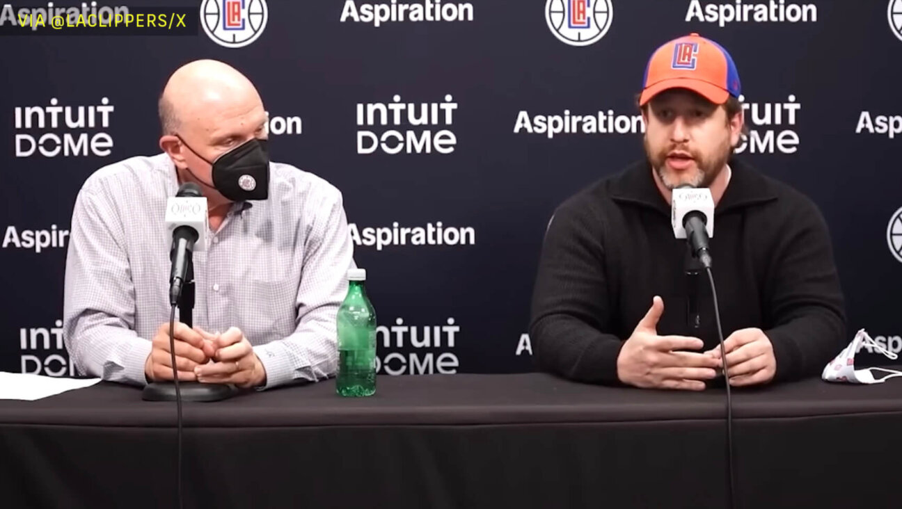 Joe Sanberg, right, with Steve Ballmer at a press conference announcing Aspiration's partnership with the Los Angeles Clippers.