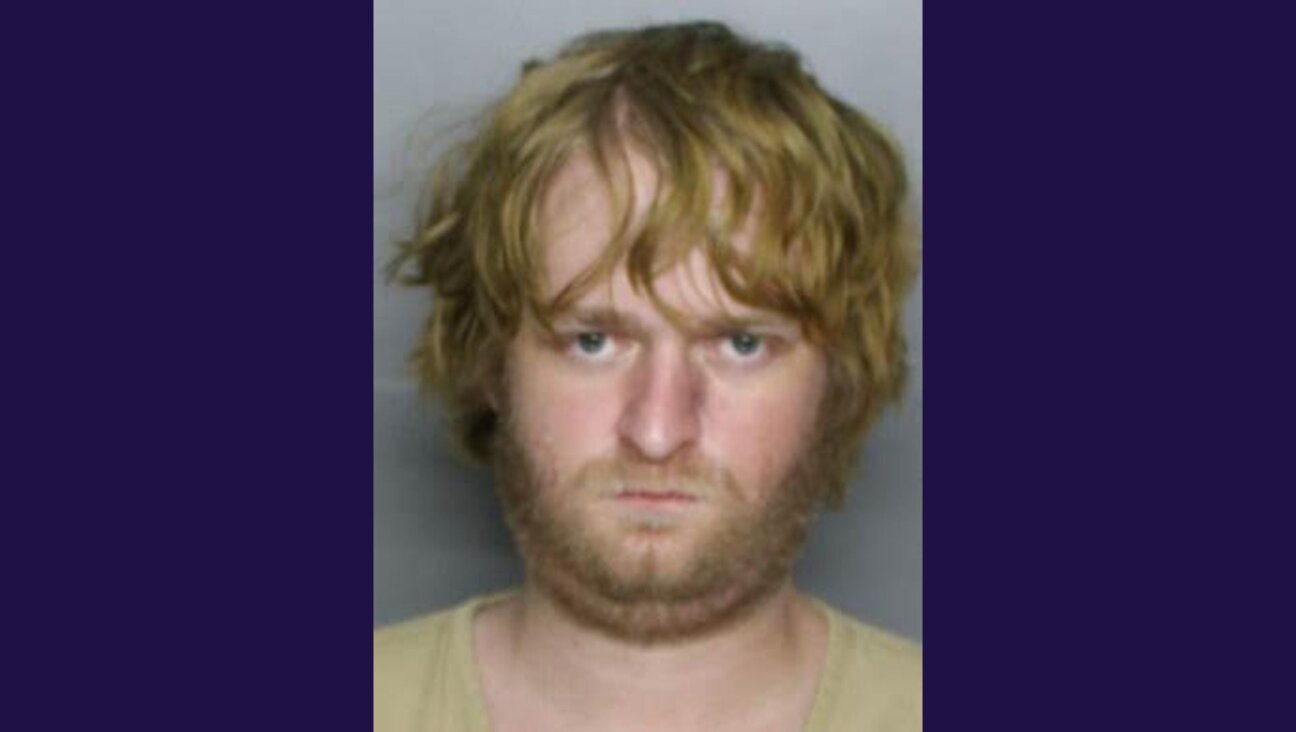 Blake Richard Hoover, 31, was arrested Monday on charges of arson and criminal mischief. 