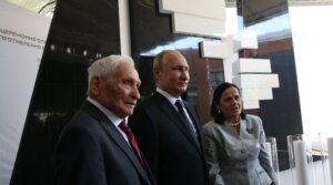Russian President Vladimir Putin and Aron Bell pose for a photo at the Jewish Museum and Tolerance Center in Moscow, Russia on June 4, 2019. 