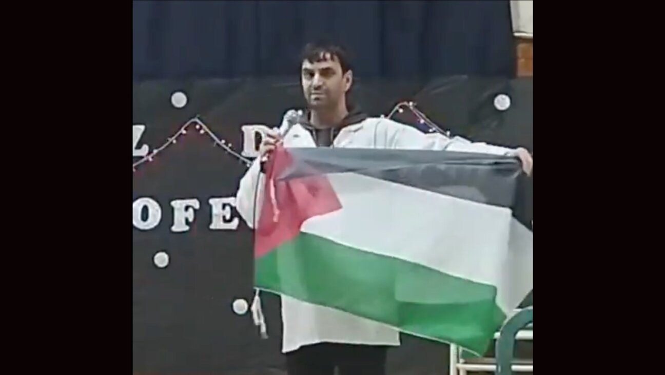 Federico Puy, a teacher in Buenos Aires, is facing penalties after unfurling a Palestinian flag at a school assembly.