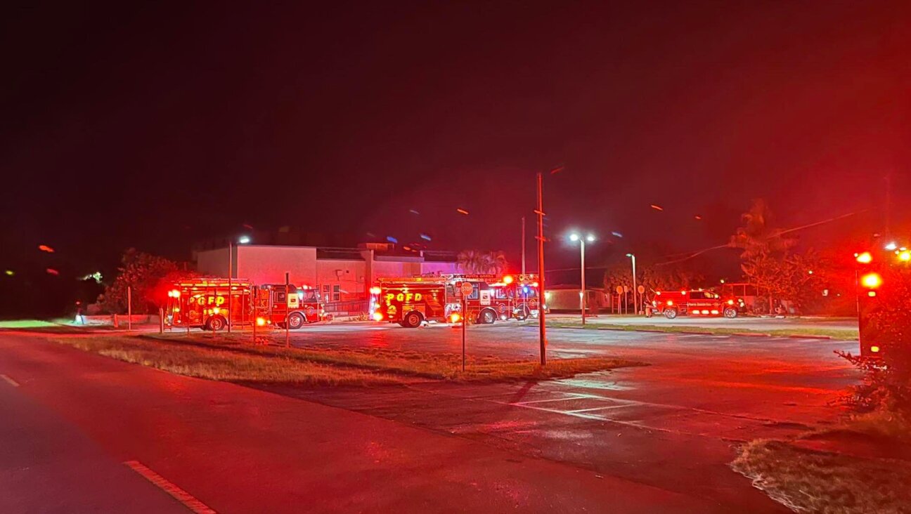 Firefighters respond to a blaze at the Chabad of Charlotte County. 