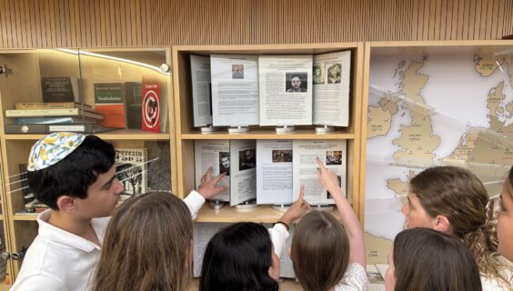 Students at the Ramaz Middle School visit the Holocaust library on Yom Hashoah, April 23, 2025