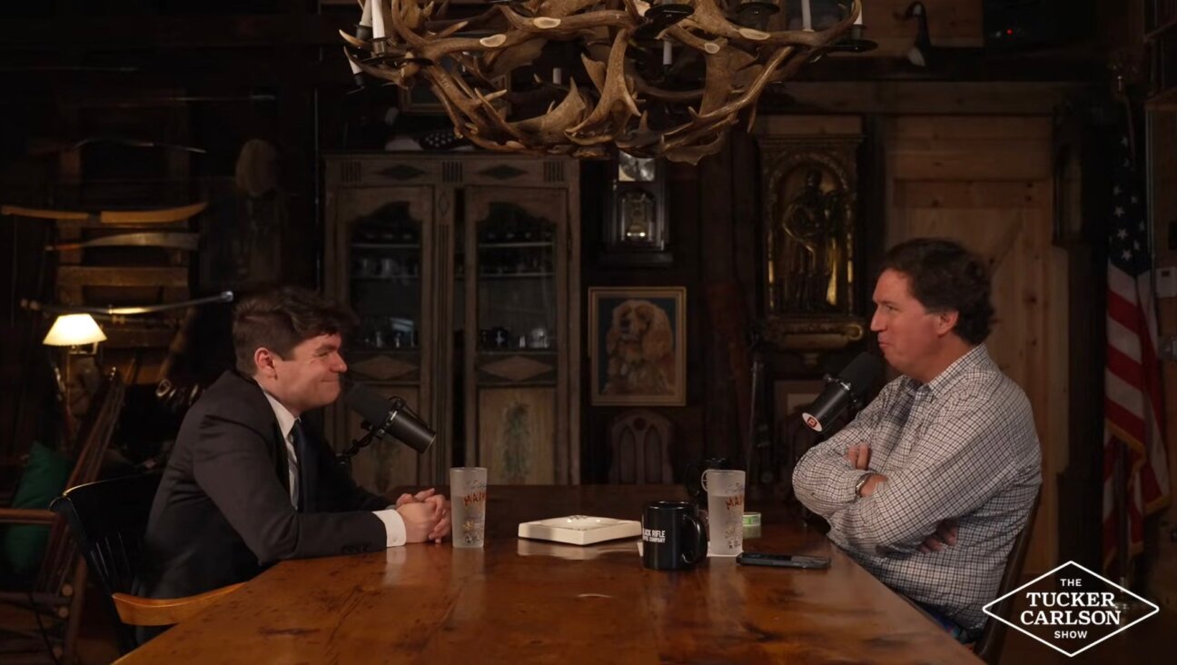 Nick Fuentes sits down for an interview with Tucker Carlson, Oct. 28, 2025.