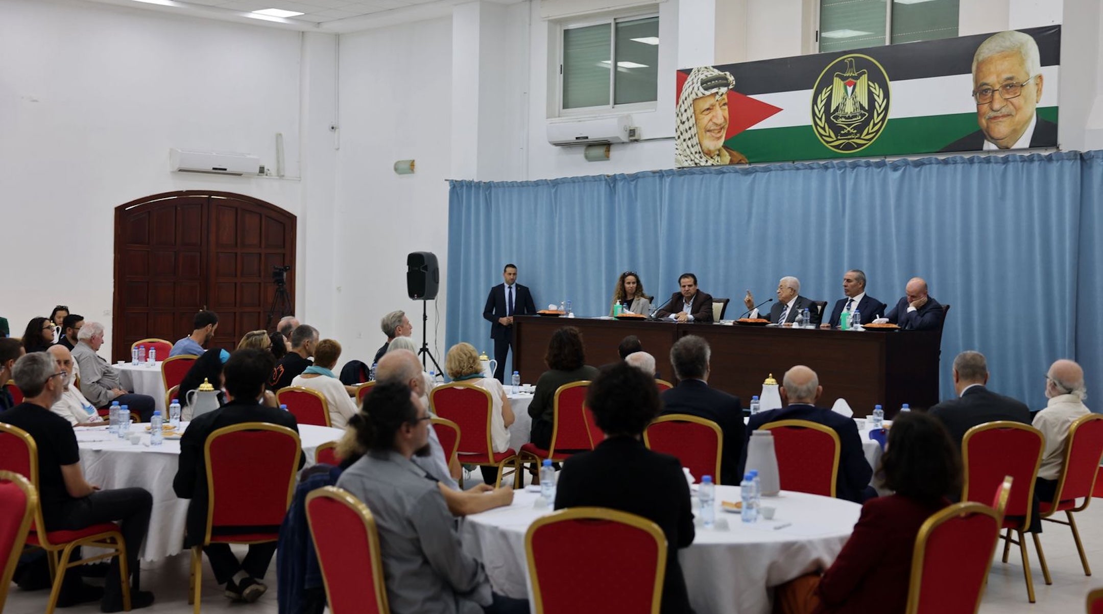 Mahmoud Abbas speaks to Israeli activists alongside PA leadership and Ayman Odeh. 